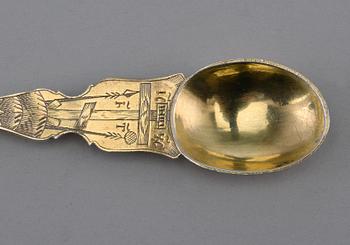 A SPOON, 84 silver, gilt. Marked Aл Moscow 1827. Weight 26 g.