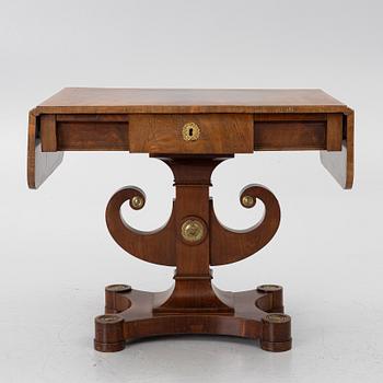 An Empire table, first half of the 19th century.