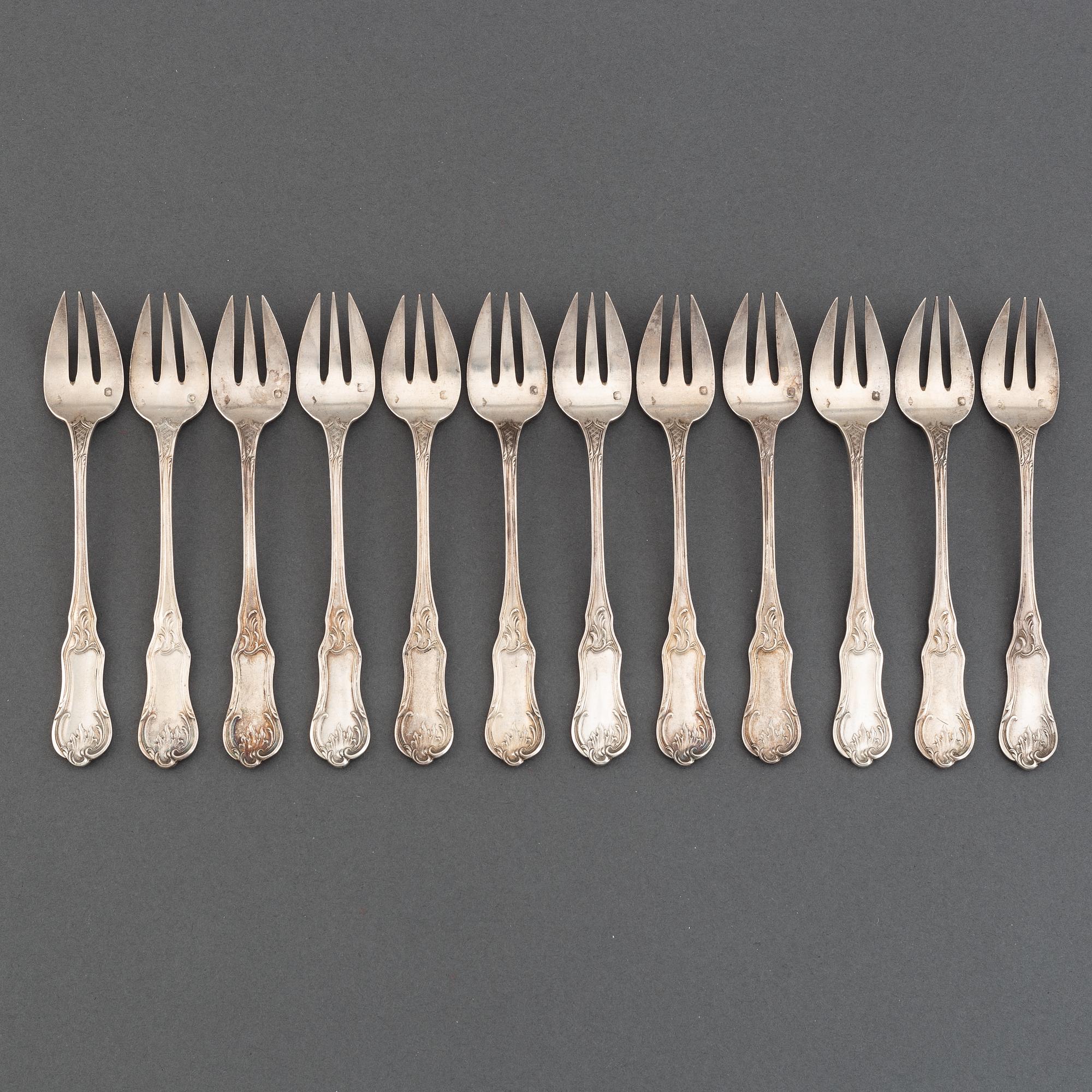 A set of twelve French silver oister-forks, after 1838.