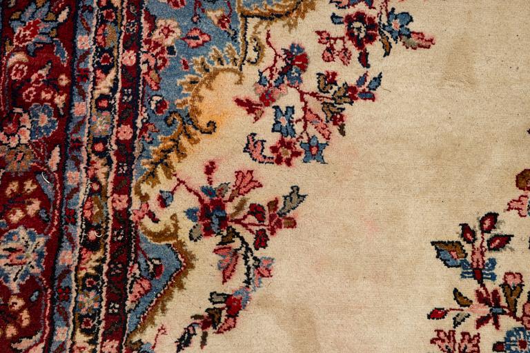 An oriental carpet, c. 370x260 cm.