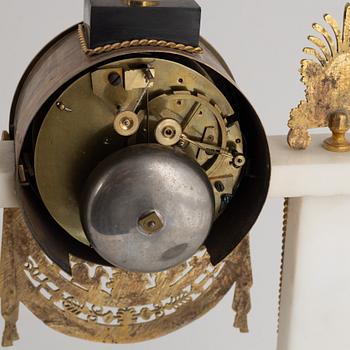 A French Louis XVI ormolu and marble portico clock, late 18th century.