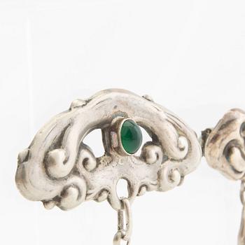 Brooches, 2 pieces, Art Nouveau, early 20th century, pewter, moonstone, and green stone.