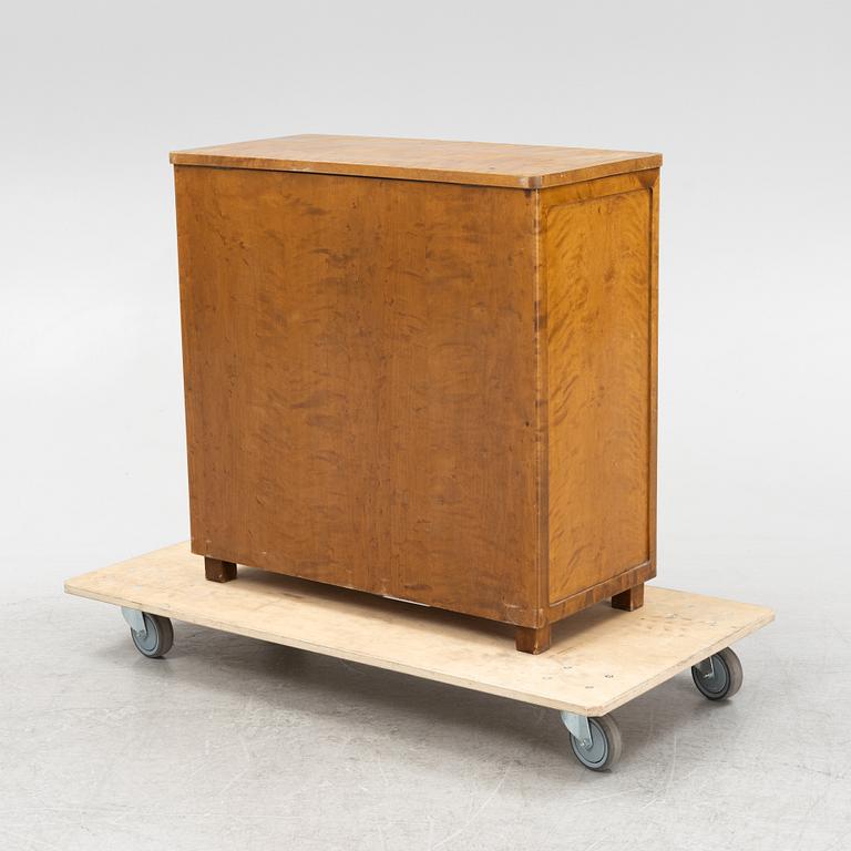 Axel Larsson, attributed, a stained birch cabinet, probably by Svenska Möbelfabrikerna Bodafors, 1930's/40's.