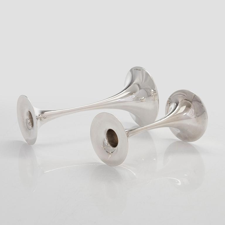 Tapio Wirkkala, A set of four silver candlesticks, "Trumpetti", Kultakeskus, Hämeenlinna 1979 and 1990.