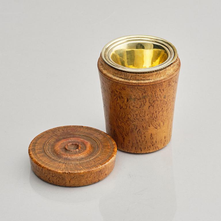 Three Swedish 18th century parcel-gilt silver beakers and a case of birch, different maker's.