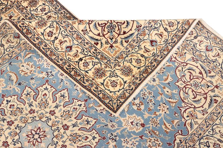 A Nain, part silk carpet, c. 196 x 120 cm.