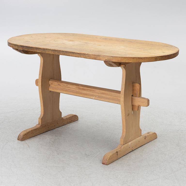 A pine wood table, folk art, 19th century.