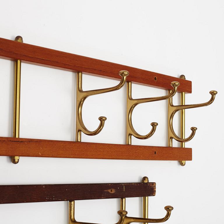 Two 'Dekorativ' coat hangers, Skogslunds metallgjuteri, Anderstorp, mid 20th Century.