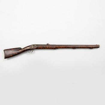 A mid 19th century percussion rifle.