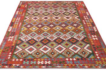 A Kilim carpet, c. 344 x 255 cm.