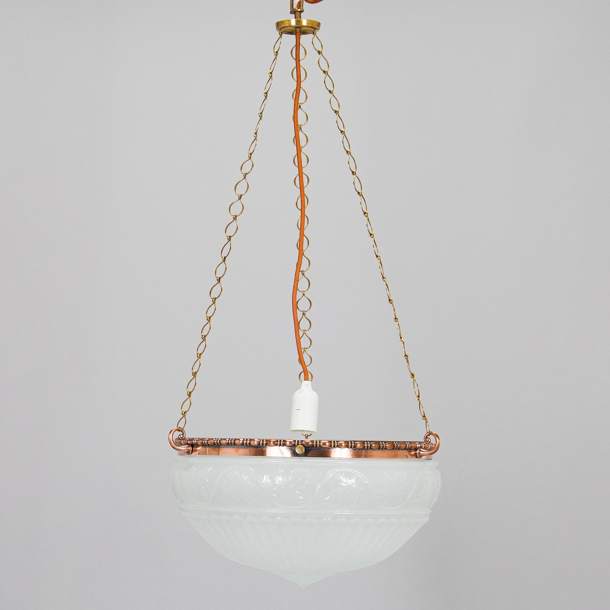 Kattovalaisin, 1900-luvun alku.