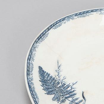 A 42-piece set of Arabia faience dinnerware, late 19th century.