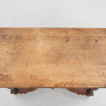 A table, late 19th century. Baroque style.