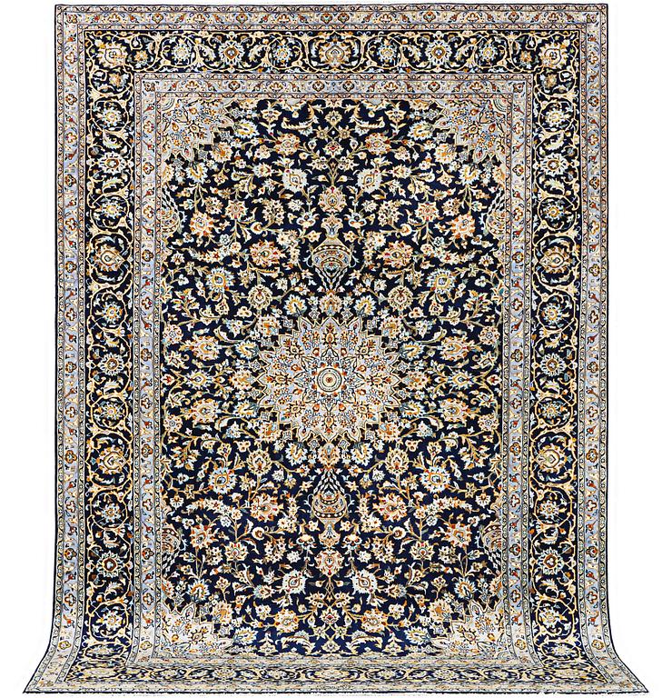 A Kashan carpet, c. 343 x 236 cm.