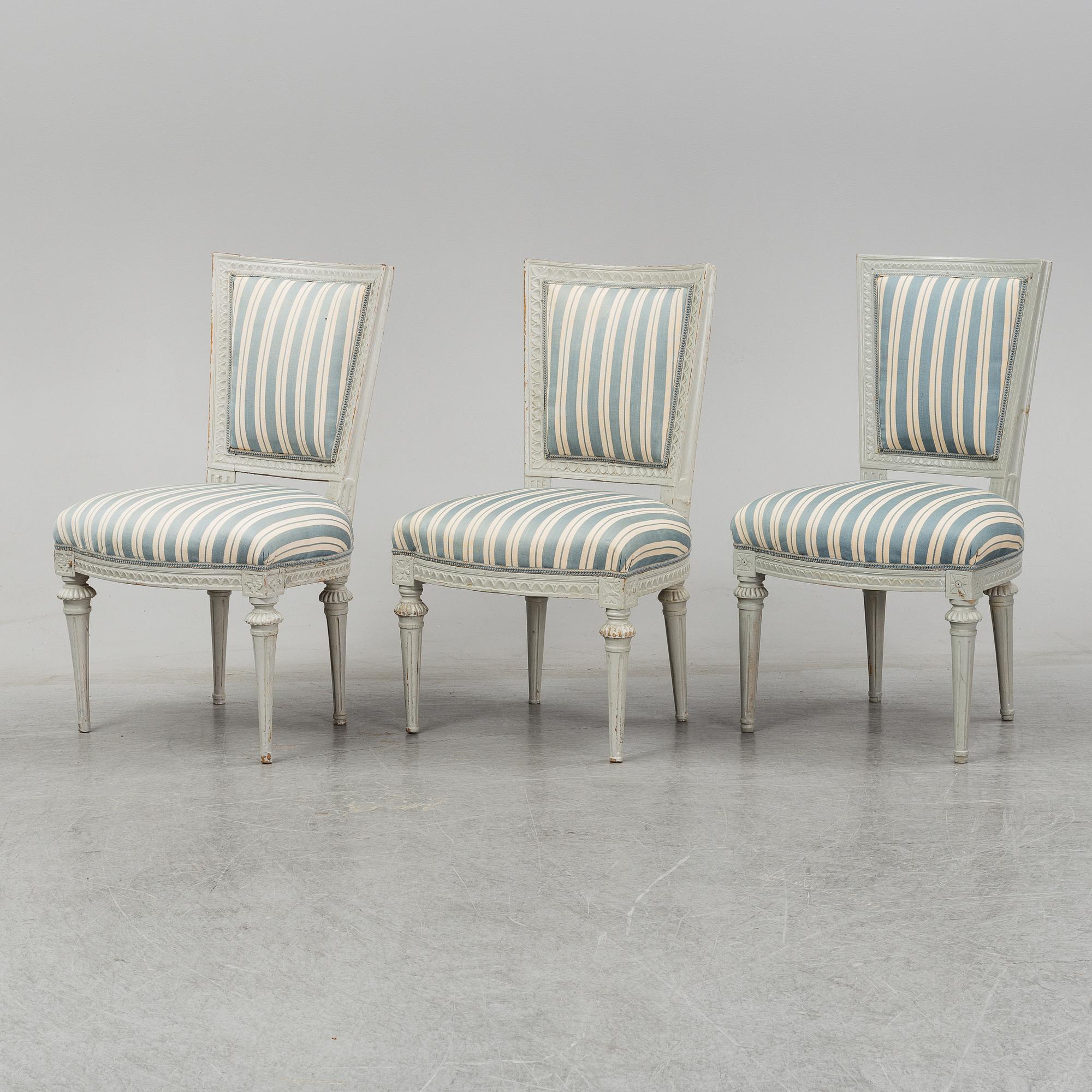 Six (3+2+1) late 18th century Gustavian chairs.