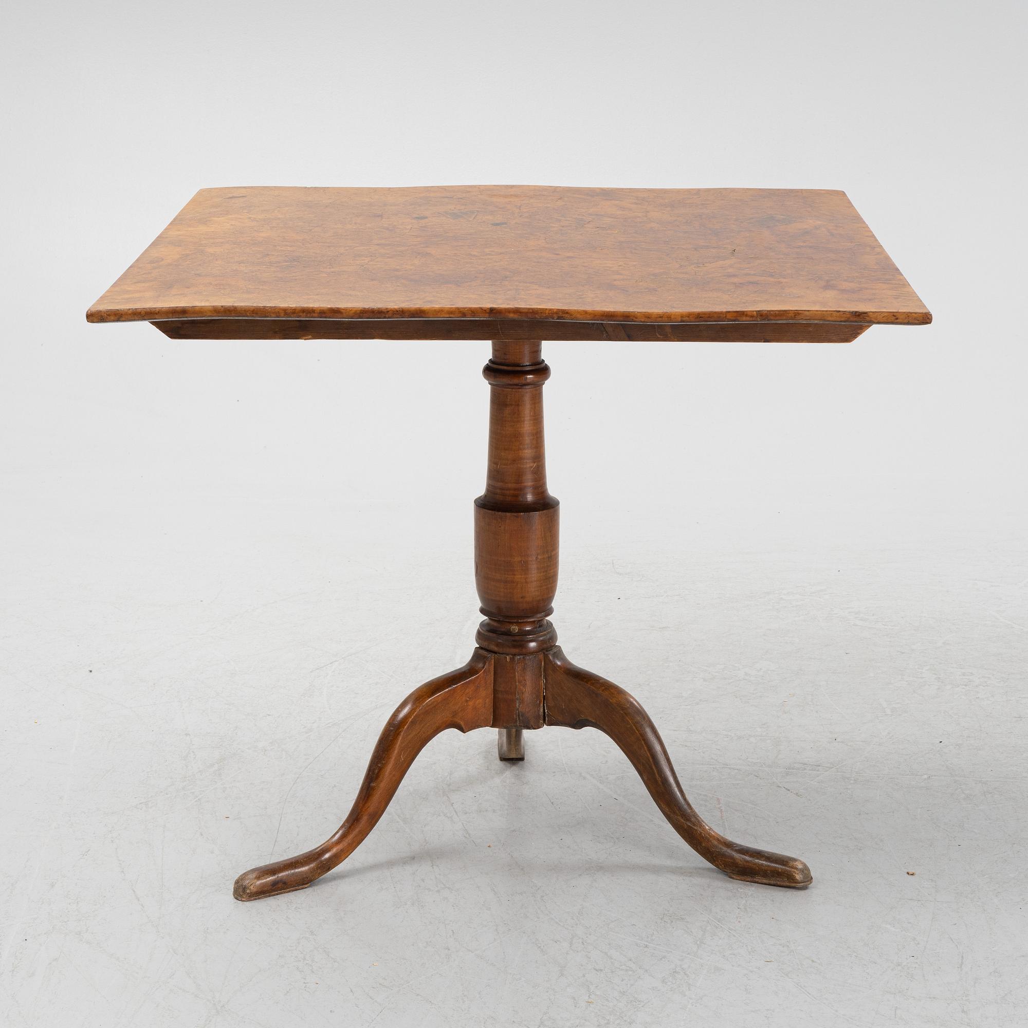 A Swedish alder and birch tilt-top table, early 19th Century.
