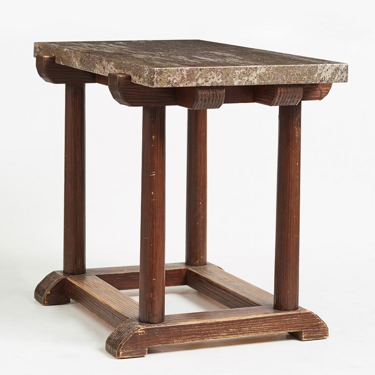 Axel Einar Hjorth, a "Sandhamn" stained pine and granite top table, Nordiska Kompaniet, Sweden 1930's.