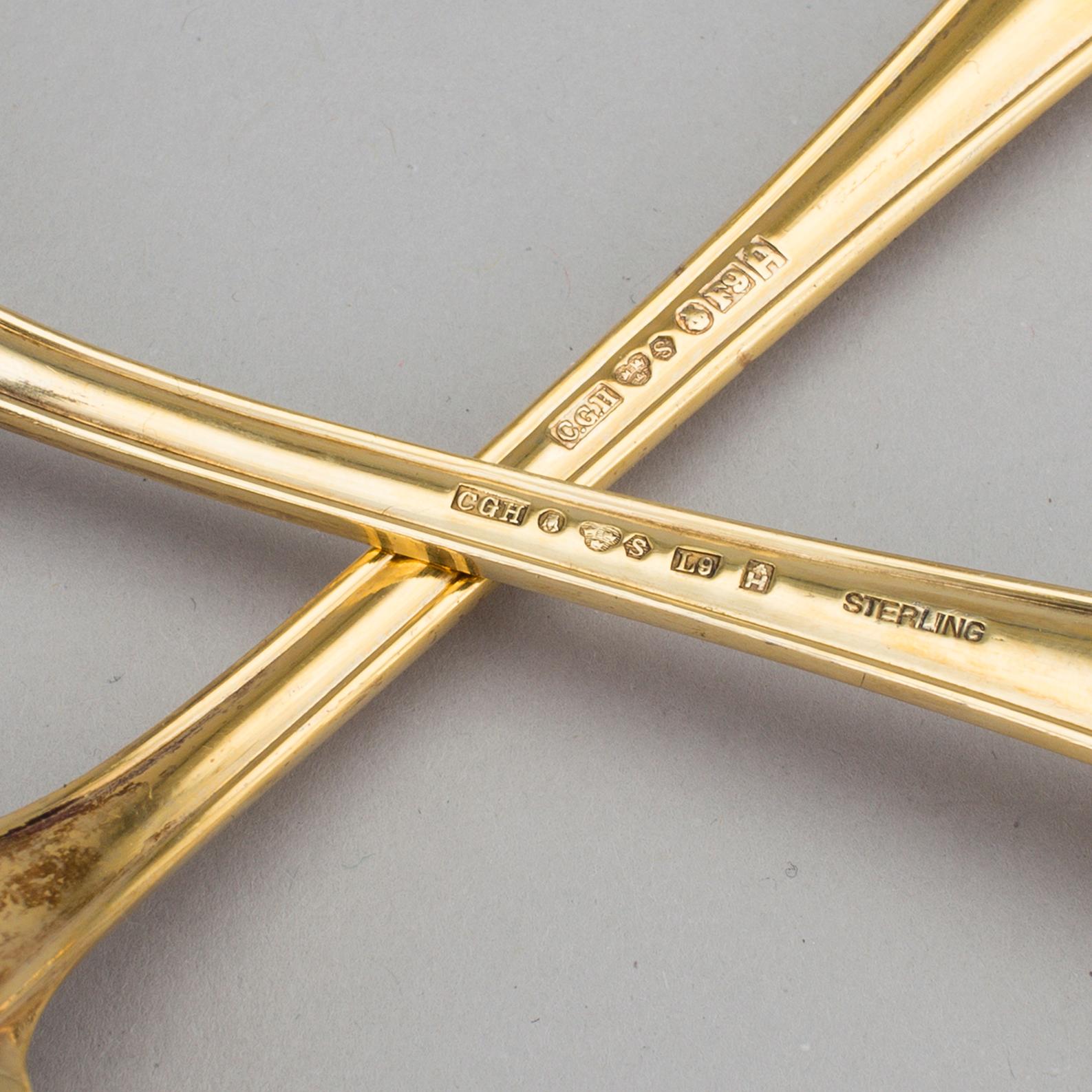 A set of 60 pieces of cutlery gilded sterling silver by CG Hallberg in Stockholm 1957-1961. Total weight c. 3950 gram.