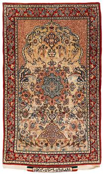 410. A semi-antique Isfahan rug, central Iran, part silk, signed (Mohammed) Seirafian, c. 120 x 70 cm.