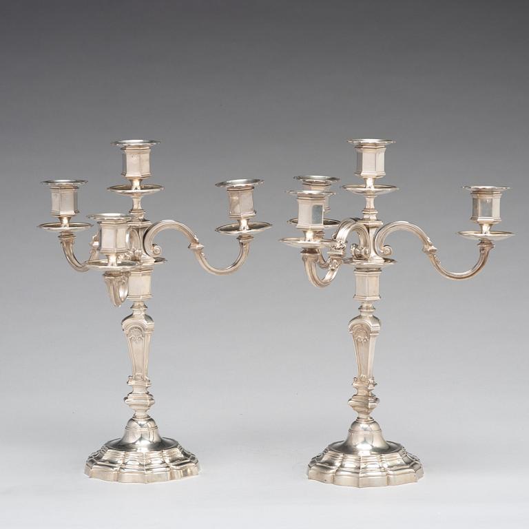 A pair of French 20th century silver 950/1000 four light candelabra, marked Mon Odiot.