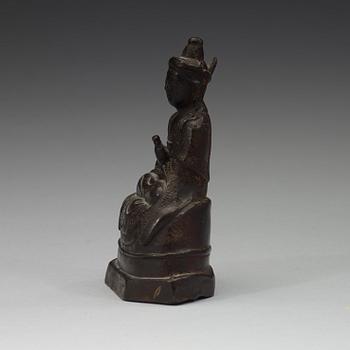 A seated bronze figure of a monk, Ming dynasty (1368-1644).