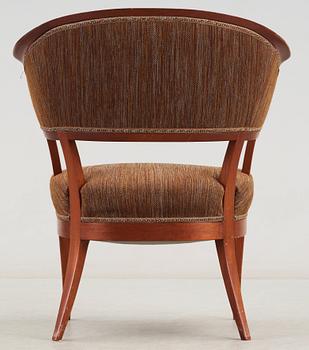 A Carl Malmsten mahogany easy chair 'Jonas Love', Sweden.