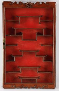 A Chinese wall display cabinet, second half of the 20th century.