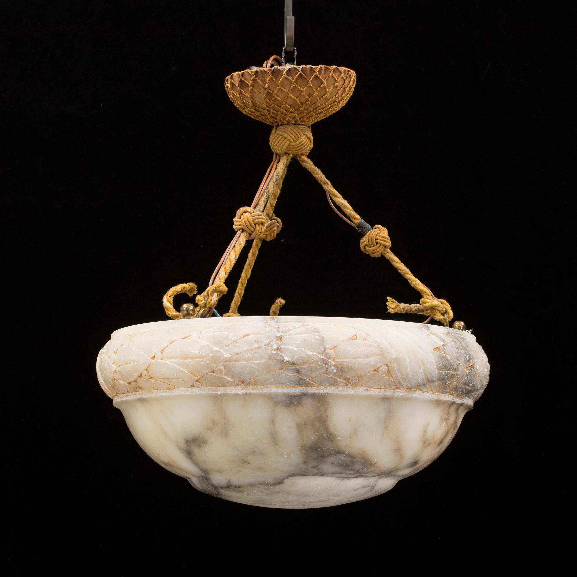 An early 20th century alabaster ceiling lamp.