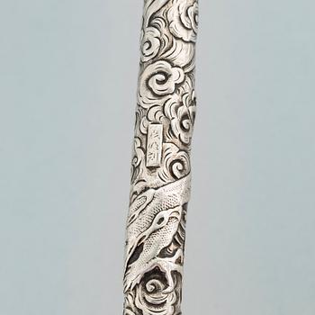 A Japanese silver opium pipe, Meiji period (1868-1912).