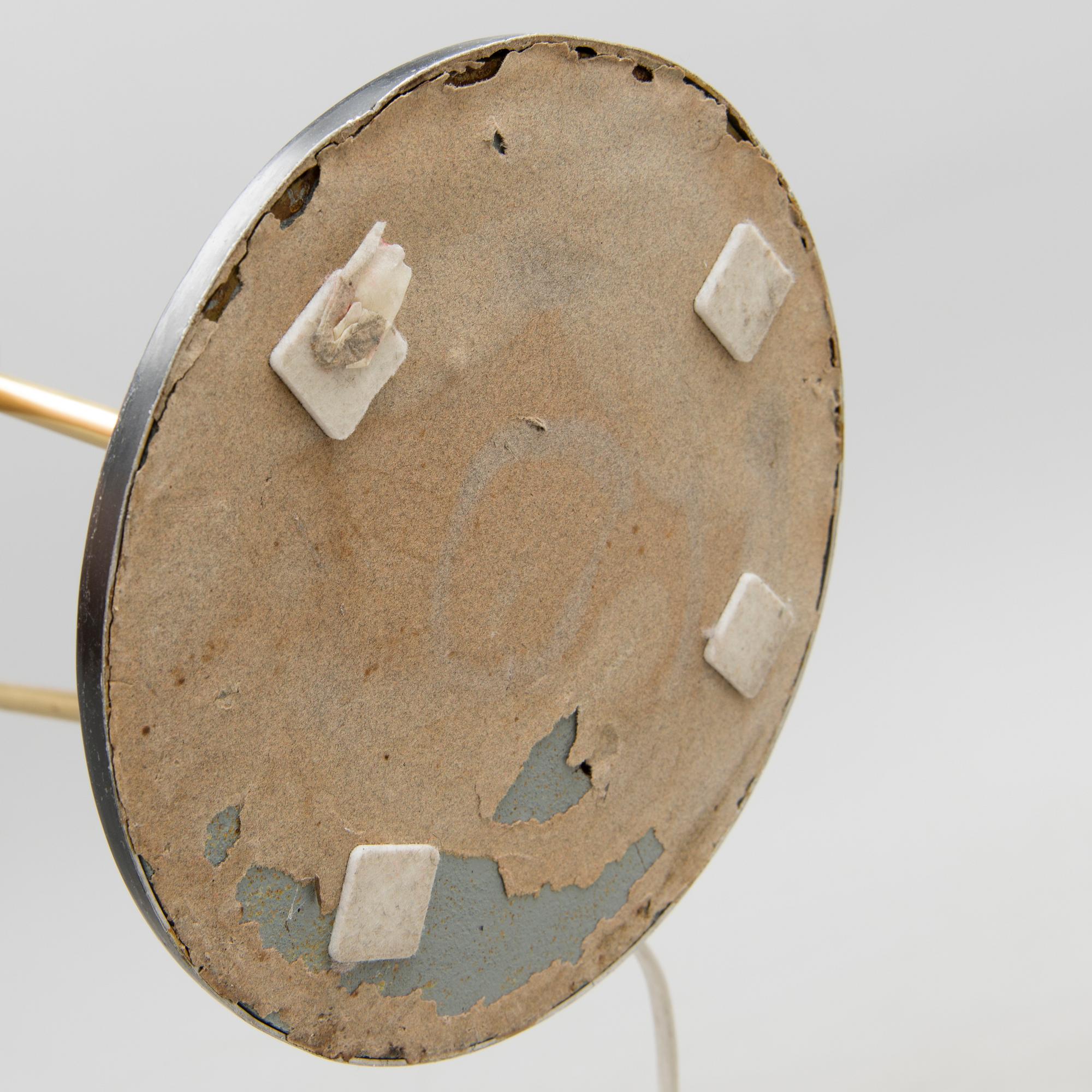 A mid-20th Century floor lamp.