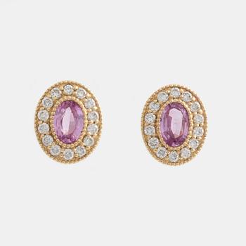 Earrings with pink sapphires and brilliant-cut diamonds.