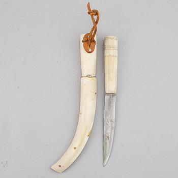 A reindeer horn Sami knife, signed SJ.