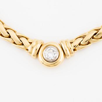 Collier/armband med en rund briljantslipad diamant ca 0.35 ct.