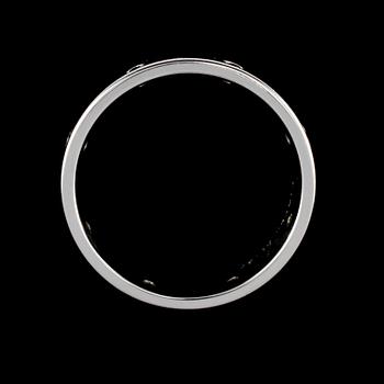 RING, 18k vitguld med 8 svarta briljantslipade diamanter, totalt 0.16 ct, Scahlins No1, Scahlins, Stockholm. Vikt 12 g.