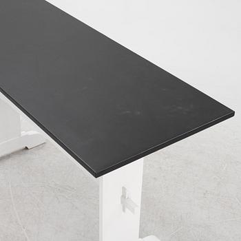 A painted table, 20th Century.
