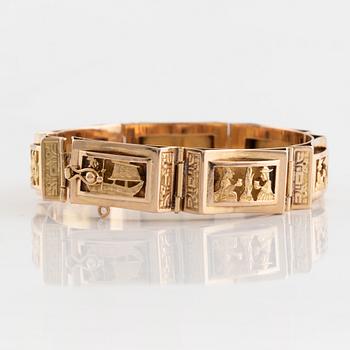 Armband, guld, paneler med figurmotiv.