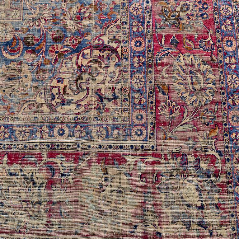 A semi-antique silk Kashan, ca 316 x 205.