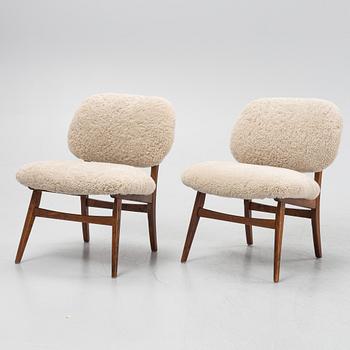A pair of mid 20th century lounge chairs.