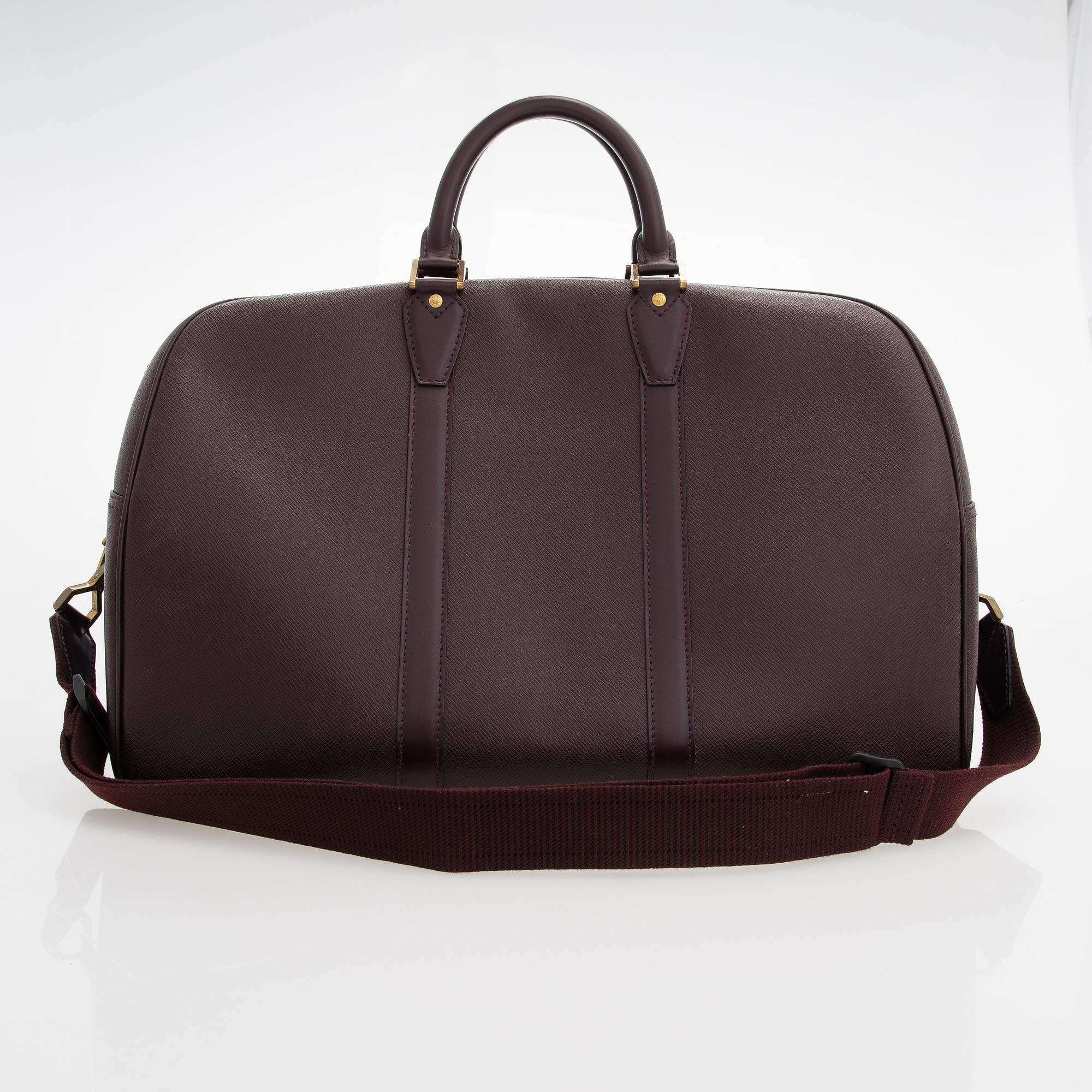 Louis Vuitton, 'Taiga Kendall PM' Bag.