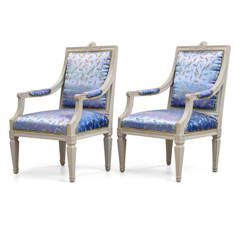 A pair of large Gustavian late 18th century armchairs.
