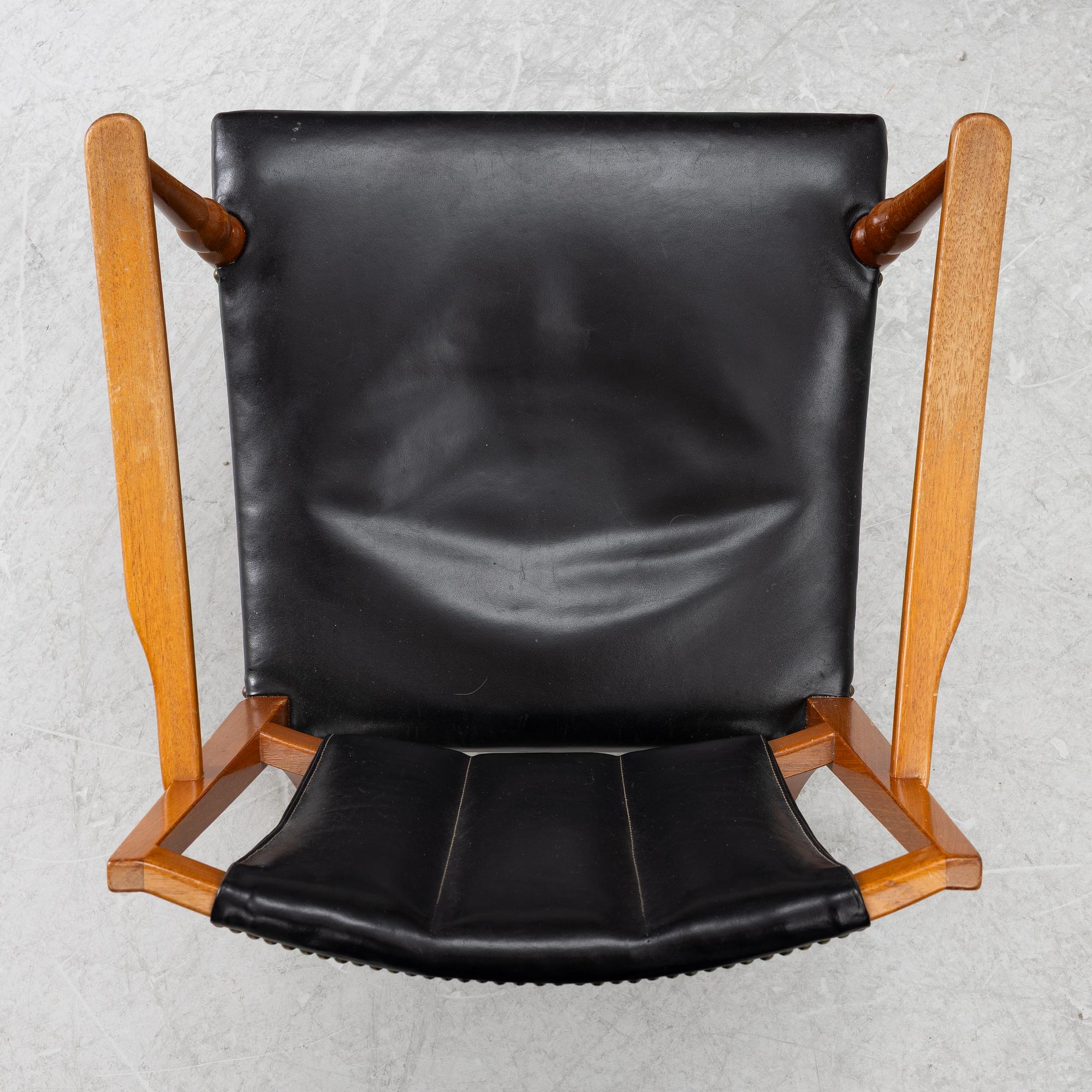 Josef Frank, two armchairs, model B 2067, Svenskt Tenn pre 1985.