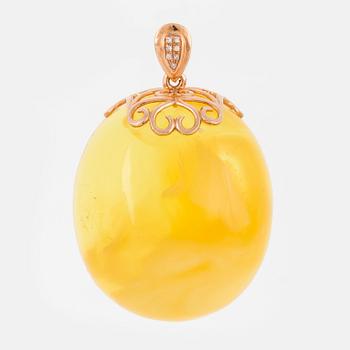 Amber pendant, 18K gold with diamonds.