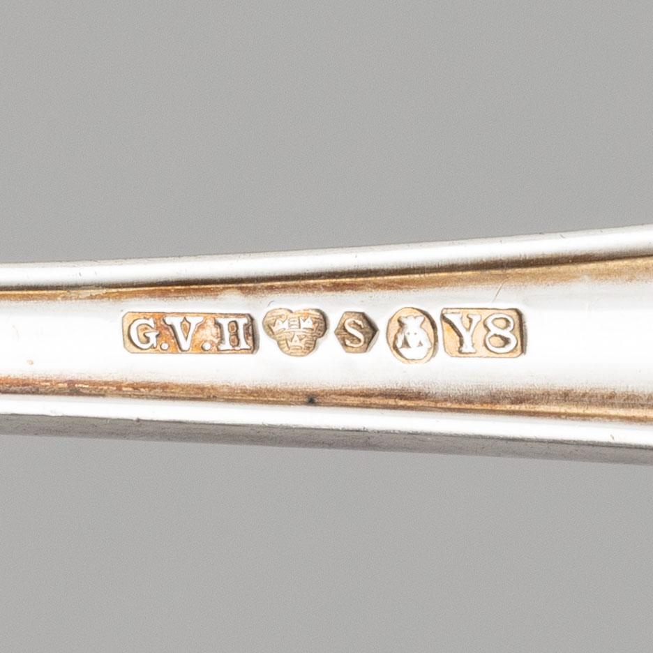 A Swedish silver cutlery set, model "Slottsbarock", CG Hallberg, Guldvaruhuset, Stockholm, some 1944 (64 pieces).