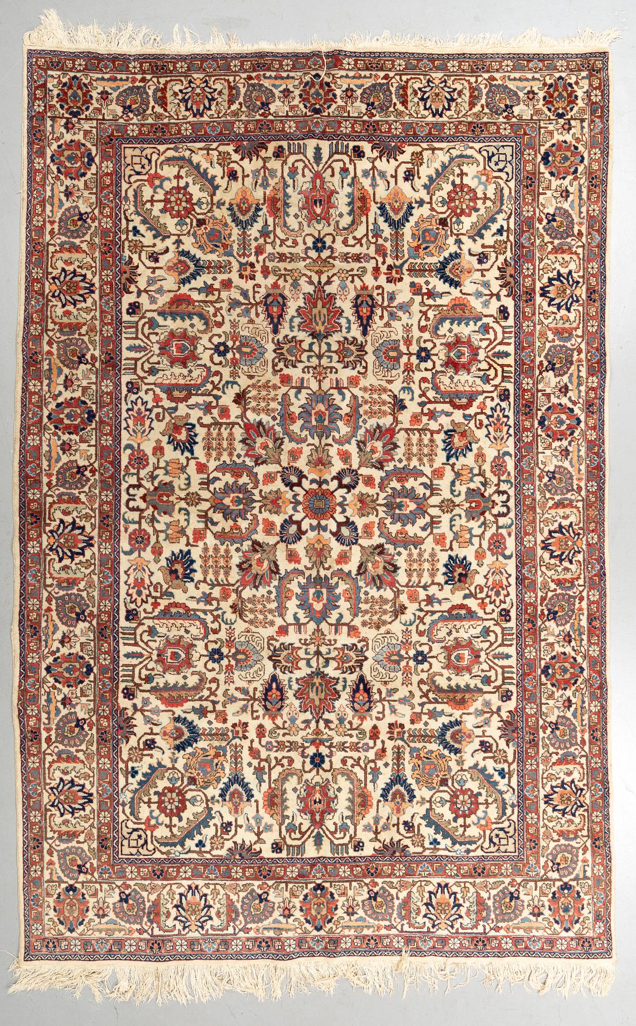 A carpet, semi-antique Tabriz,  342 x 231 cm.
