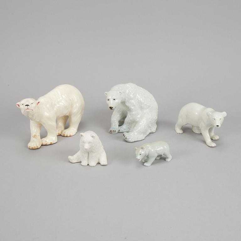 Five ceramic polar bears.