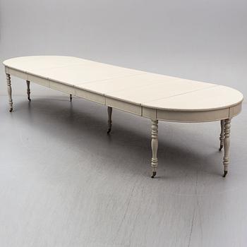 A mid 19th century painted dining table.