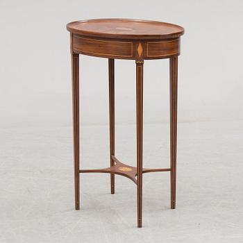 An early 19th century mahogany veneered table.