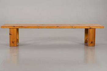 A PINE WOOD BENCH.