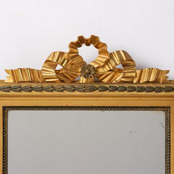 A pair of two-branch giltwood girandole mirrors attributed to P. Ljung (1743-1819).