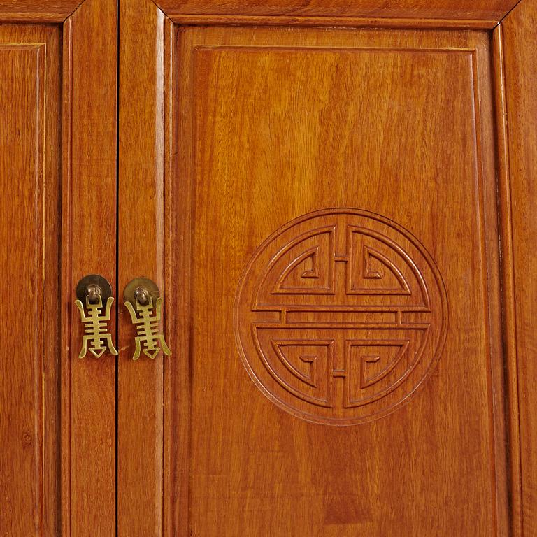 A Chinese hardwood cabinet, second half of the 20th century.